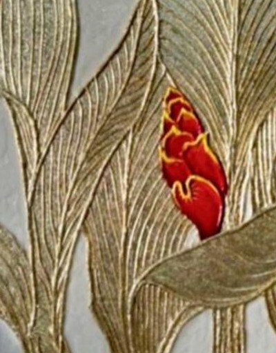 Detail of gilded botanical relief with painted bloom